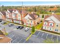 Aerial view of townhome community, highlighting the subject property at 2634 Sunrise Shores Dr, Kissimmee, FL 34747
