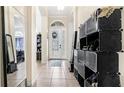Bright and spacious entryway with tiled floors at 728 Longford Loop, Apopka, FL 32703