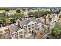 Bird's-eye view of upscale townhomes near golf course at 1310 Seven Eagles Ct # 301, Reunion, FL 34747