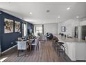 Open concept kitchen and dining area with modern appliances and island at 2785 Flushing Dr, Apopka, FL 32703