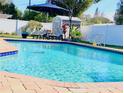 Inviting swimming pool with brick decking at 326 Benton St, Orlando, FL 32839