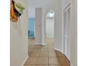 Condo entryway with tile flooring and coat rack at 588 Brantley Terrace Way # 303, Altamonte Springs, FL 32714