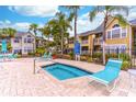 Relaxing spa area with lounge chairs and hot tub at 1057 S Hiawassee Rd # 1911, Orlando, FL 32835