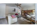 Spacious living room with a fireplace and comfy seating at 15941 Sw 8Th Pl, Ocala, FL 34481