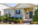 Single story home with a covered porch and well-maintained landscaping at 16626 Point Rock Dr, Winter Garden, FL 34787