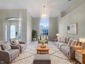 Spacious living room featuring neutral colors and a comfy seating area at 1878 Algonquin Ave, Deltona, FL 32725
