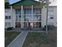 Front view of condo building showcasing its architectural details at 1902 Honour Rd # 9, Orlando, FL 32839