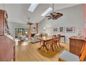 Dining room with hardwood floors and wood table at 2498 Timberline Dr # 2498, Winter Park, FL 32792