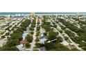 Aerial view showing home's location in a quiet residential neighborhood near the beach at 801 E 8Th Ave, New Smyrna Beach, FL 32169