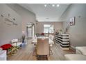 Bright dining area with modern table and chairs at 1748 Christina Lee Lane, St Cloud, FL 34769