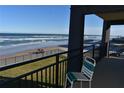 Balcony with ocean view and chairs at 2301 S Atlantic Ave # 240, Daytona Beach, FL 32118