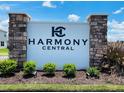 Harmony Central community entrance sign with stone pillars and landscaping at 4472 Sagefield Dr, St Cloud, FL 34773
