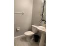 Clean and simple bathroom with white fixtures at 6344 Earthgold Dr, Windermere, FL 34786