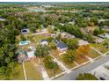 Aerial view showing home, pool, and surrounding area at 2711 W Highland Ave, Apopka, FL 32712