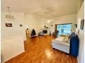 Spacious living room with hardwood floors and fireplace at 567 Rachael Court, Oviedo, FL 32765