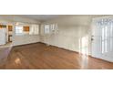 Living room with laminate floors and kitchen views at 637 19Th St, Orlando, FL 32805