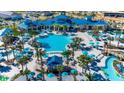 Community pool and recreation area with water features at 1721 Kona Ln, Davenport, FL 33897