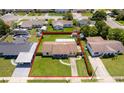 House with a large backyard and a fenced area at 6655 Durango Ct, Orlando, FL 32809