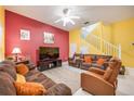 Living Room with brown sofas and a large flat-screen TV at 111 Vista Dr, Davenport, FL 33897