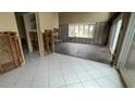 Kitchen with tile flooring, needing renovation and new cabinets at 1450 Warrior Trl, Deltona, FL 32725