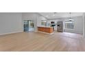 Open concept living room with kitchen and island at 326 Morning Creek Cir, Apopka, FL 32712