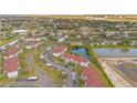 Aerial view showcasing community buildings and landscape at 3714 Palm Desert Ln # 5317, Orlando, FL 32839