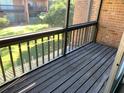 Screened porch with wooden deck and backyard view at 5123 Picadilly Circus Ct # 2, Orlando, FL 32839