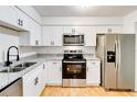 Bright kitchen with stainless steel appliances, granite countertops, and new cabinets at 542 Orange Dr # 22, Altamonte Springs, FL 32701
