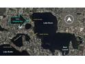 An aerial view of a home near Lake Down with canal access and a nearby boat launch at 11036 Schooner Way, Windermere, FL 34786