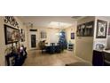 Bright dining room with a table and chairs, adjacent to the kitchen at 1517 Lancashire Way, Deland, FL 32720