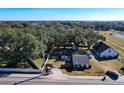 Aerial view showcasing a house and expansive backyard at 1968 Berkley Rd, Auburndale, FL 33823