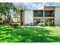 Attractive condo building with lush landscaping at 2923 Marshfield Ct # Ge, Orlando, FL 32822
