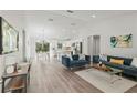 Open floor plan with modern kitchen, island, and spacious living area at 4386 Sw 169Th Lane Rd, Ocala, FL 34473