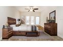 Bright bedroom with wood furniture and access to backyard at 749 Silver Birch Pl, Longwood, FL 32750