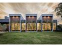 Contemporary home showcasing a unique architectural design at 8968 Bay Cove Ct, Orlando, FL 32819