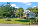 Single-Gathering home with lush landscaping at 11359 Willow Gardens Dr, Windermere, FL 34786