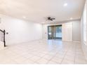 Bright living room with tiled floors and sliding glass doors at 1164 Pavia Dr, Apopka, FL 32703