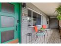 Inviting front porch with colorful seating and patterned tile at 1792 Killarney Dr, Winter Park, FL 32789