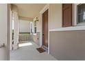 Welcoming front porch featuring a neutral color scheme and 