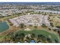 Aerial view of community showing home location and golf course at 1849 Dalton Dr, The Villages, FL 32162