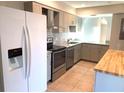 Updated kitchen, granite counters, stainless steel appliances at 5429 Vineland Rd # S, Orlando, FL 32811