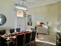 Formal dining room with a table and chairs at 6879 Remington View Ct, Orlando, FL 32829