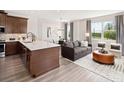 Open concept kitchen with island and stainless steel appliances at 12439 Shipwatch St, Orlando, FL 32832