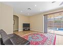 Spacious living area with tile floors, neutral walls, sliding doors to the pool, and ample natural light at 1569 Victoria Way, Winter Garden, FL 34787