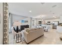 Open living room with comfortable seating and large TV at 676 Kimber Ln # 37, Debary, FL 32713
