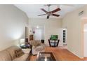 Spacious living room with tiled floors and neutral color palette at 1309 Paradise Ln, Winter Park, FL 32792