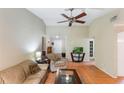 Spacious living room with tiled floors and neutral color palette at 1309 Paradise Ln, Winter Park, FL 32792