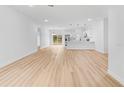Bright and spacious living area with light wood flooring at 15410 Sw 23Rd Court R, Ocala, FL 34473