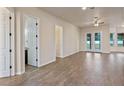 Open living space with tile floors and access to other rooms at 1943 Sipes Ave, Sanford, FL 32771