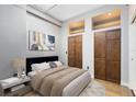 Bright bedroom with a comfortable bed and ample closet space at 62 W Colonial Dr # 205, Orlando, FL 32801